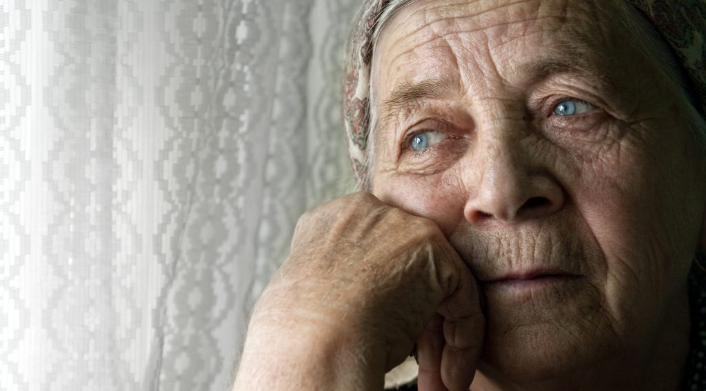 Sad lonely pensive old senior woman